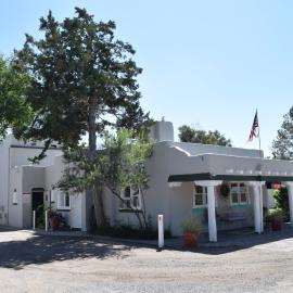 A photo of the Pueblo Revival-style Coronado Lodge in Pueblo.