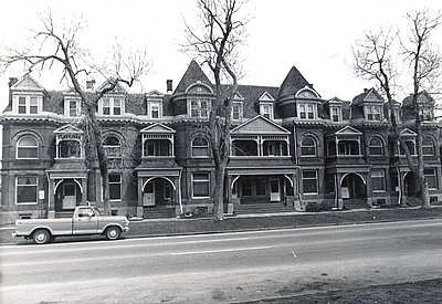 Black and white photograph of Queen Anne style row
