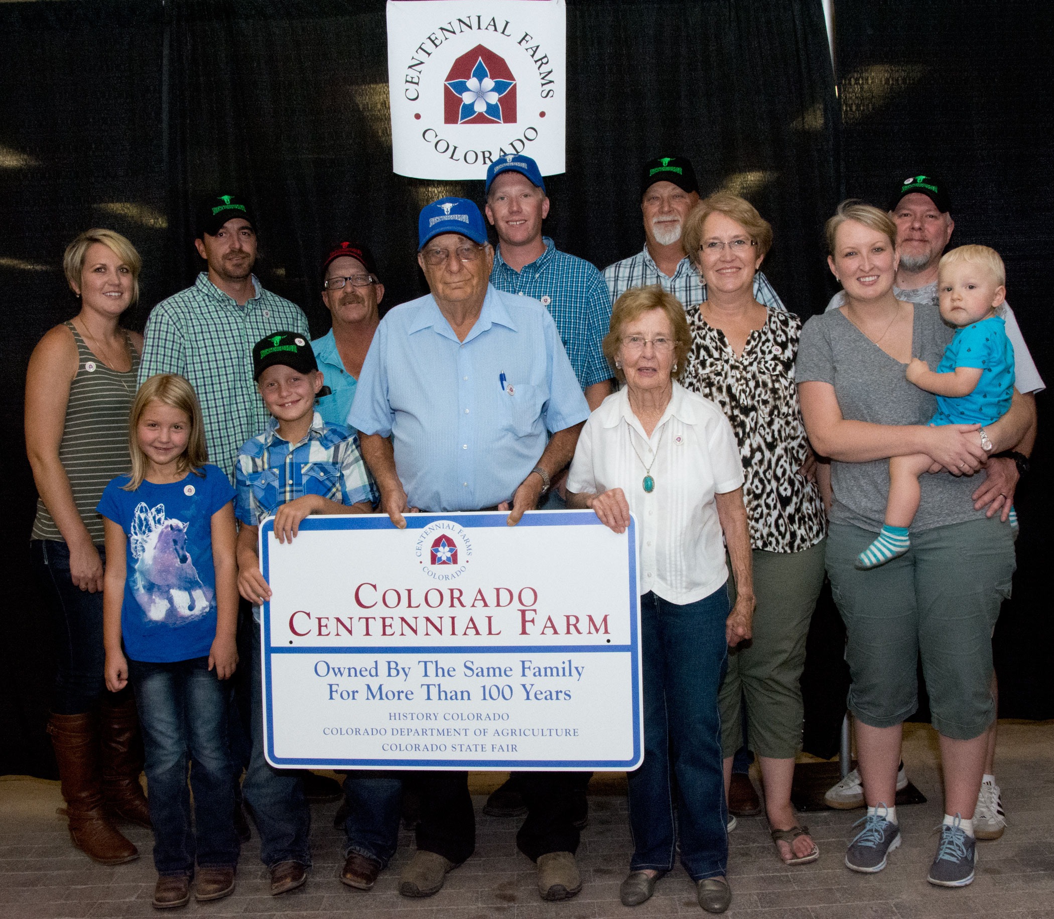The Deterding family with their Centennial Farm plaque.