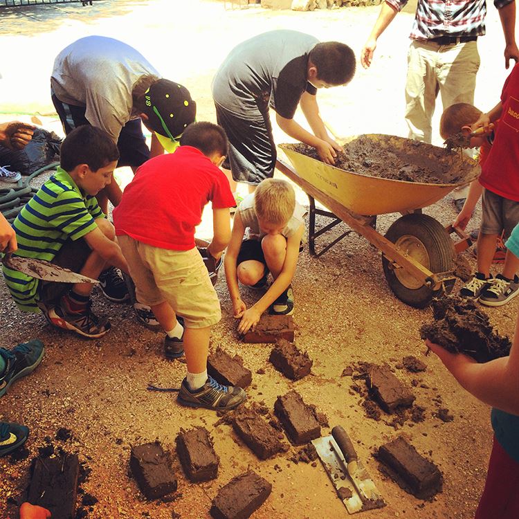 Students participating in a hands-on adobe making activity at El Pueblo History Museum.