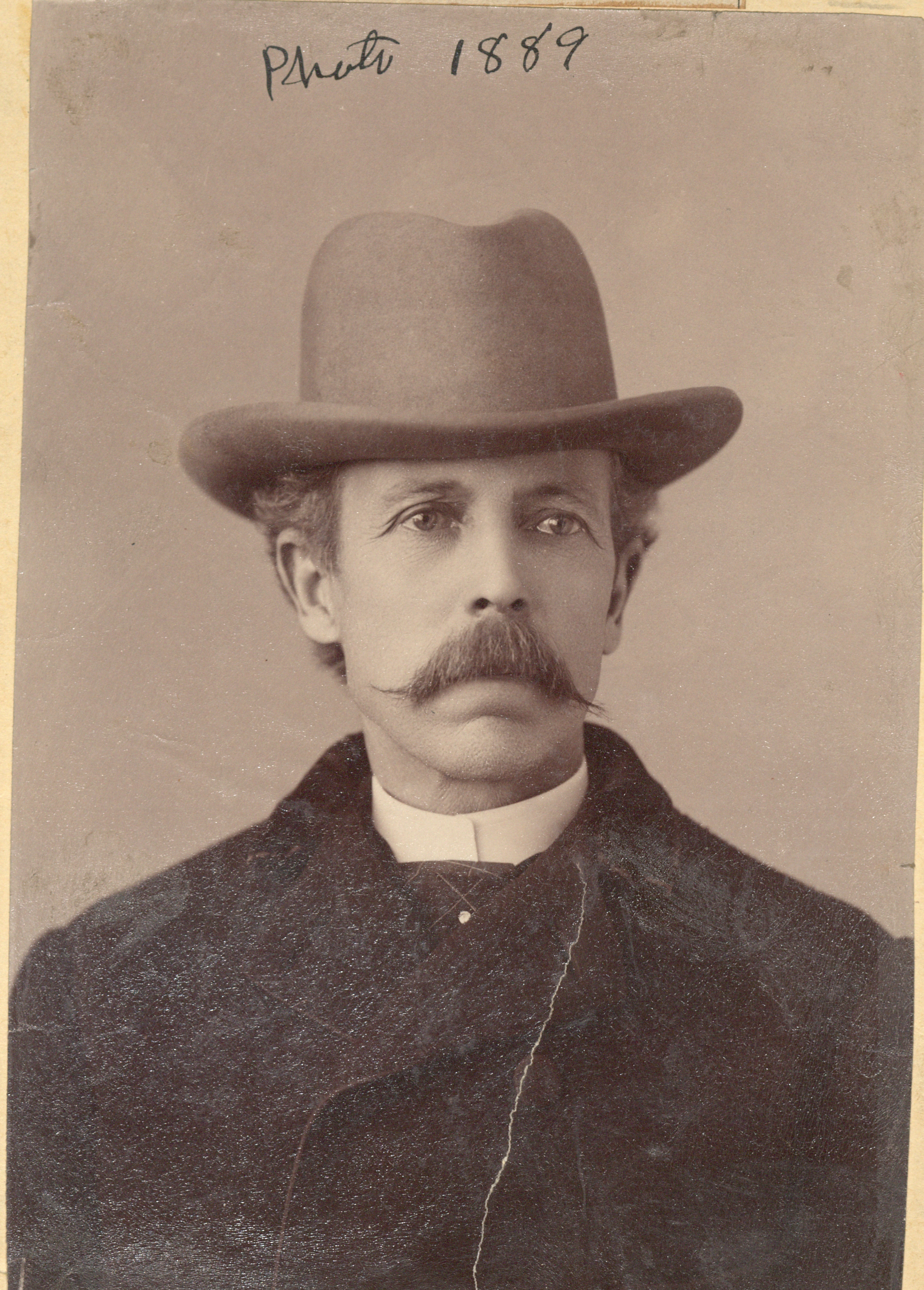 Portrait of Sam Howe with the caption 1889.