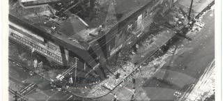 Aerial view shows a violently looted section of New Jersey's largest city after it witnessed a second night of racial disorder, late July 13th and early July 14th. Fire-bomb hurling Negroes rioted through downtown streets in a night-long rampage of burning and looting. One Negro was shot to death, a dozen other persons suffered gunshot wounds and at least 340 persons, including 27 policemen and firemen, were injured.