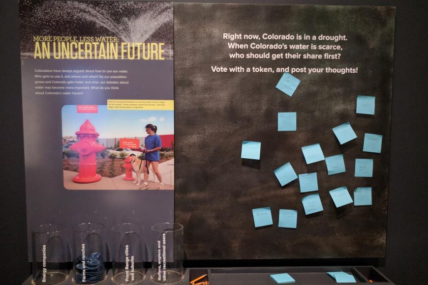 Presentation board with sticky notes about An Uncertain Future