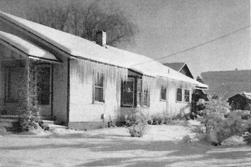 A 1948 photo on a snowy day shows the house that Clarence and Lucile Everett built after the 1942 fire.