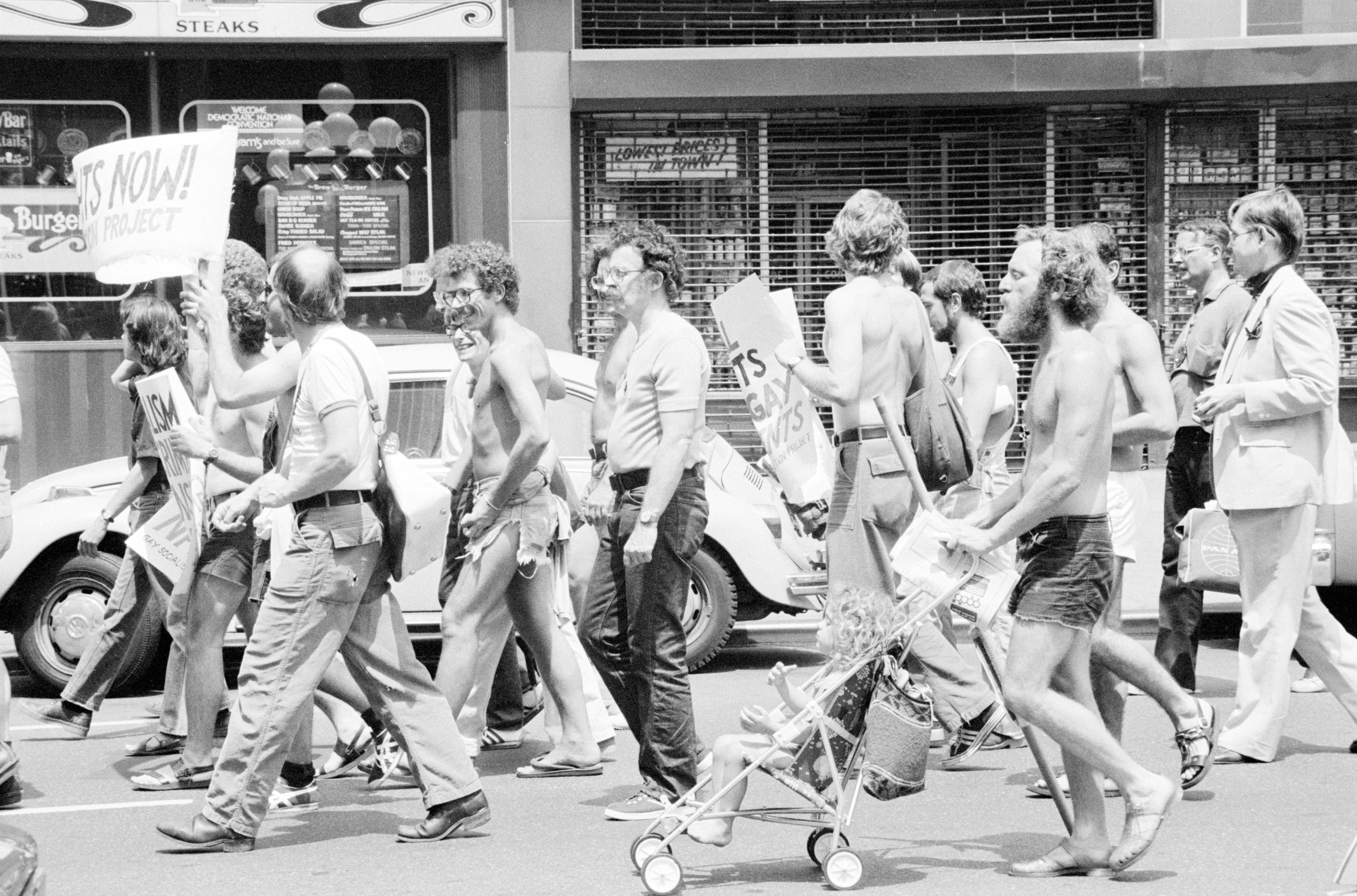 A group of men march during the 1976 DNC