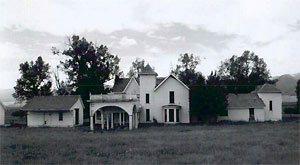 A black-and-white image of the Beckwith Ranch buildings.