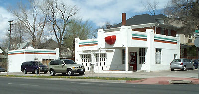 Color photo of an oblong box gas station.