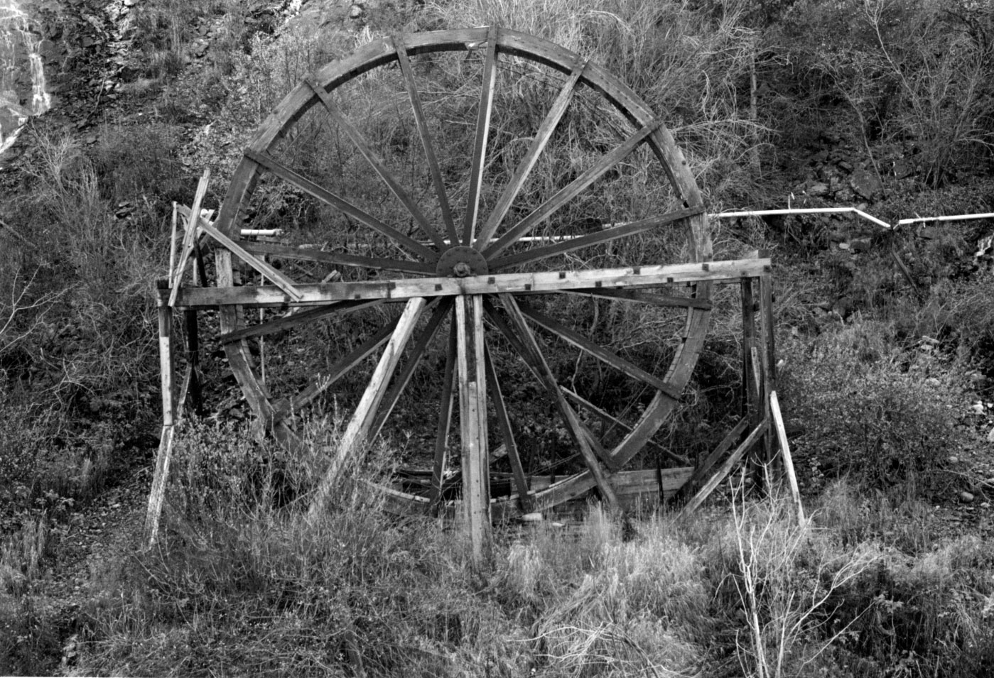 Black-and-white photo of the Charlie Tayler waterwheel.
