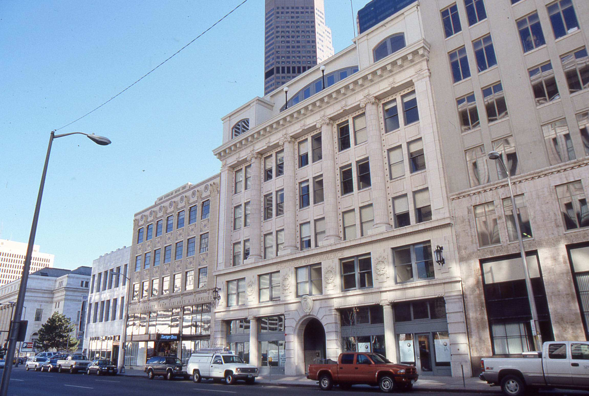 The 1700 block of Champa Street showing both the Buerger Brothers building and the Chamber of Commerce Building.
