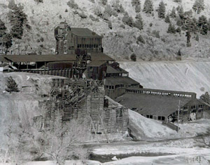 A historic photo of the mine sitting atop a ridge