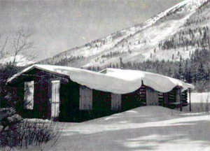 Buildings at the Winfield Mining Camp covered in snow (1973).