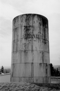 A black and white photo of the water tank. 