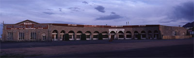 A panoramic photo of the roundhouse with arcade going around the center. 