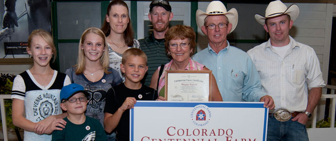 Hogan Ranch family with their Centennial Ranch award.