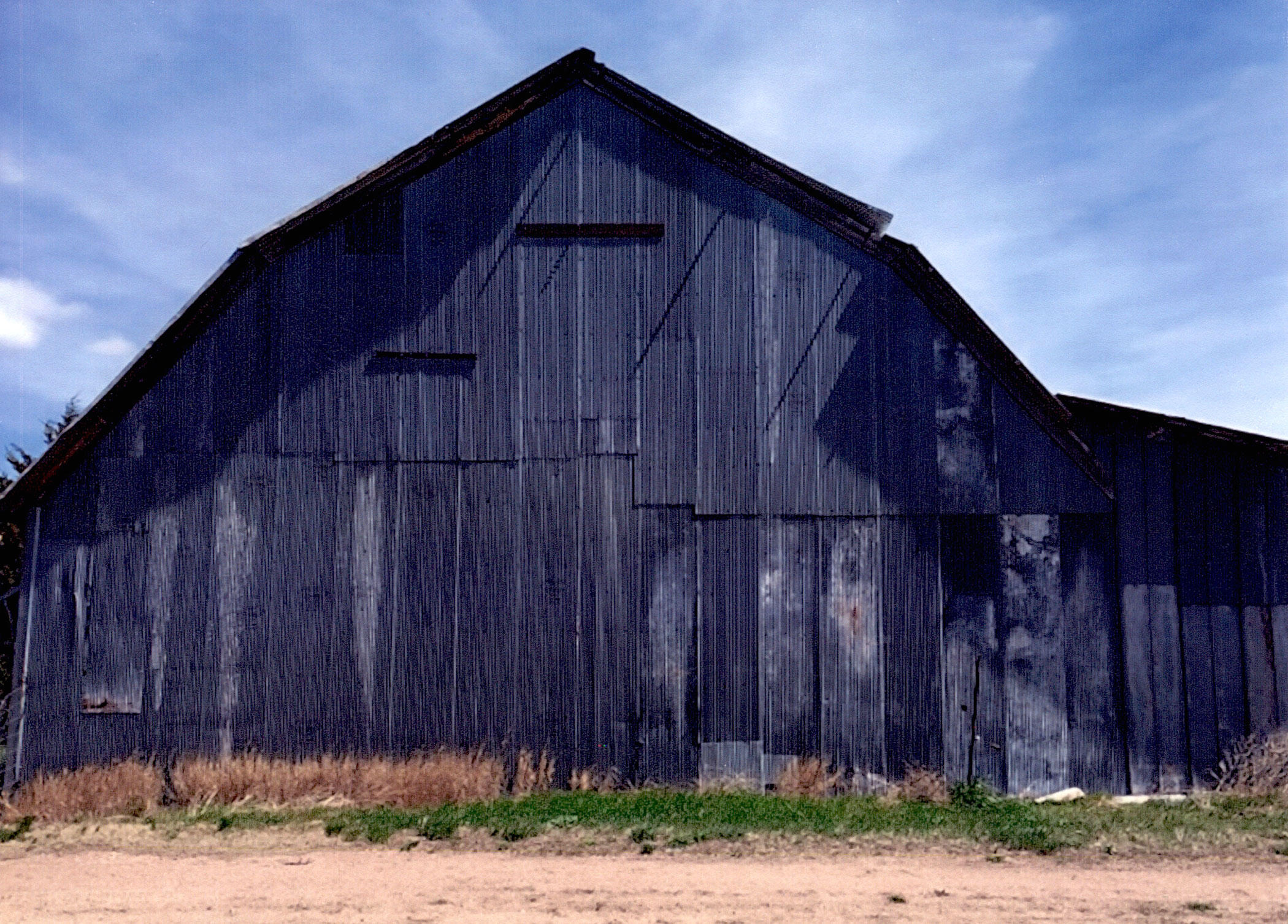 Front view of the wooden 1916 barn on the Haynes Hereford Ranch.