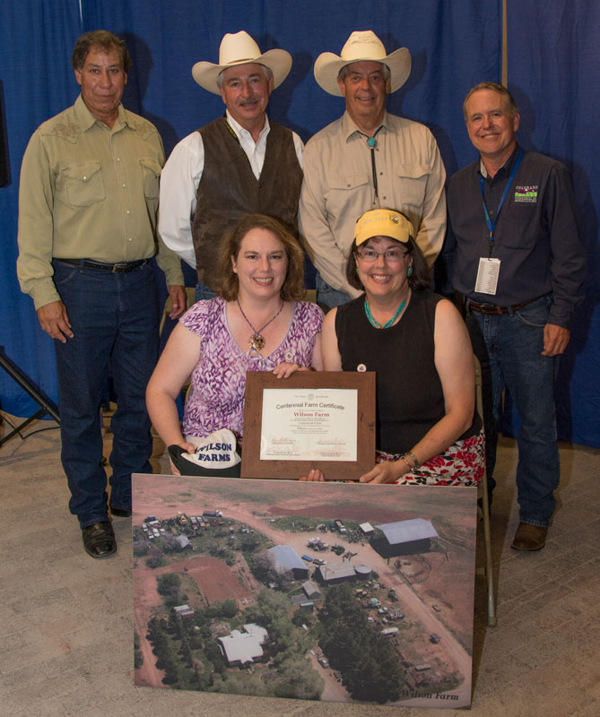 Wilson Farm family members receive their Centennial Farm award.