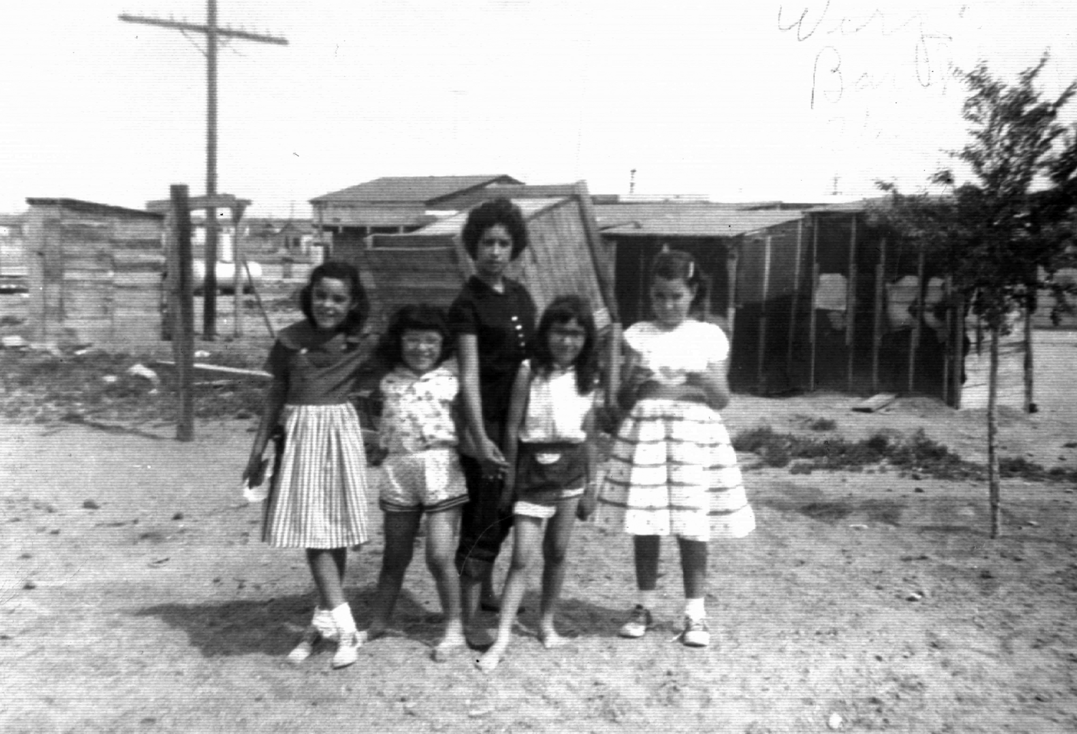 black and white photo of Hispanic family