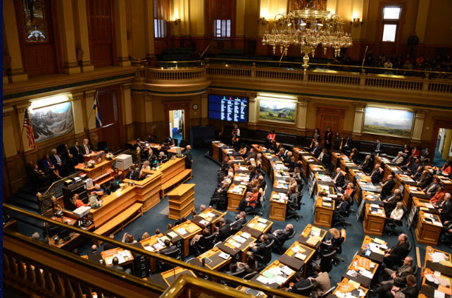 Legislators inside the Colorado State Capitol.