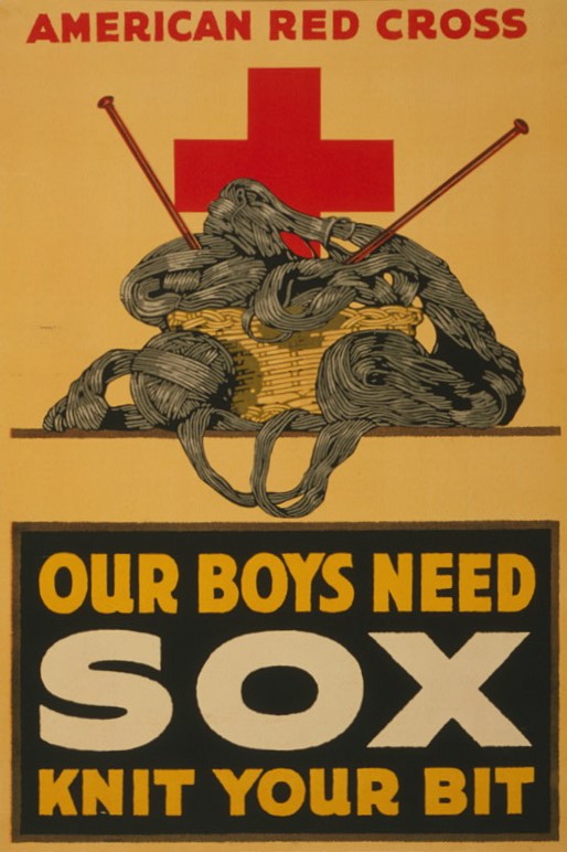 Image of a Red Cross poster from World War One that says, "Our boys need sox - knit your bit," with the words "American Red Cross" across the top of the poster. In the center of the poster is an illustration of a basket full of gray yarn, from which two red knitting needles stick out. Behind the basket of knitting supplies is a large red cross.