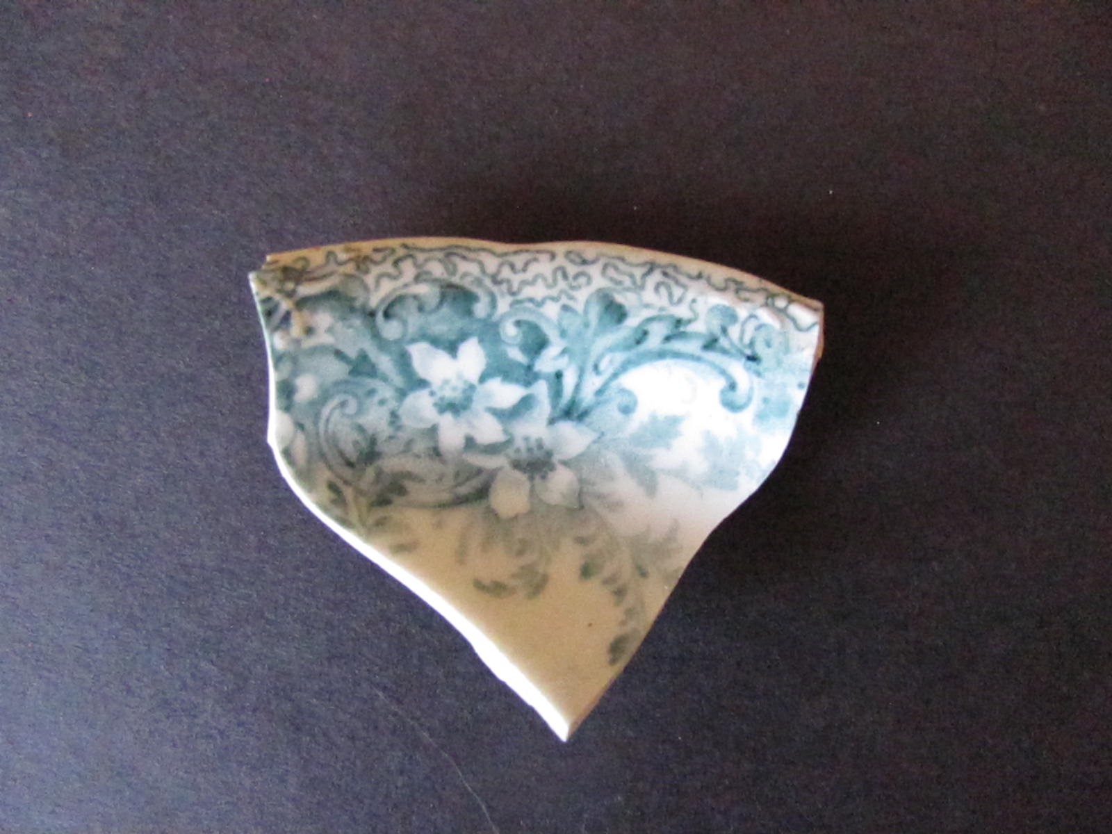 Teal pottery piece from 1818-1854
