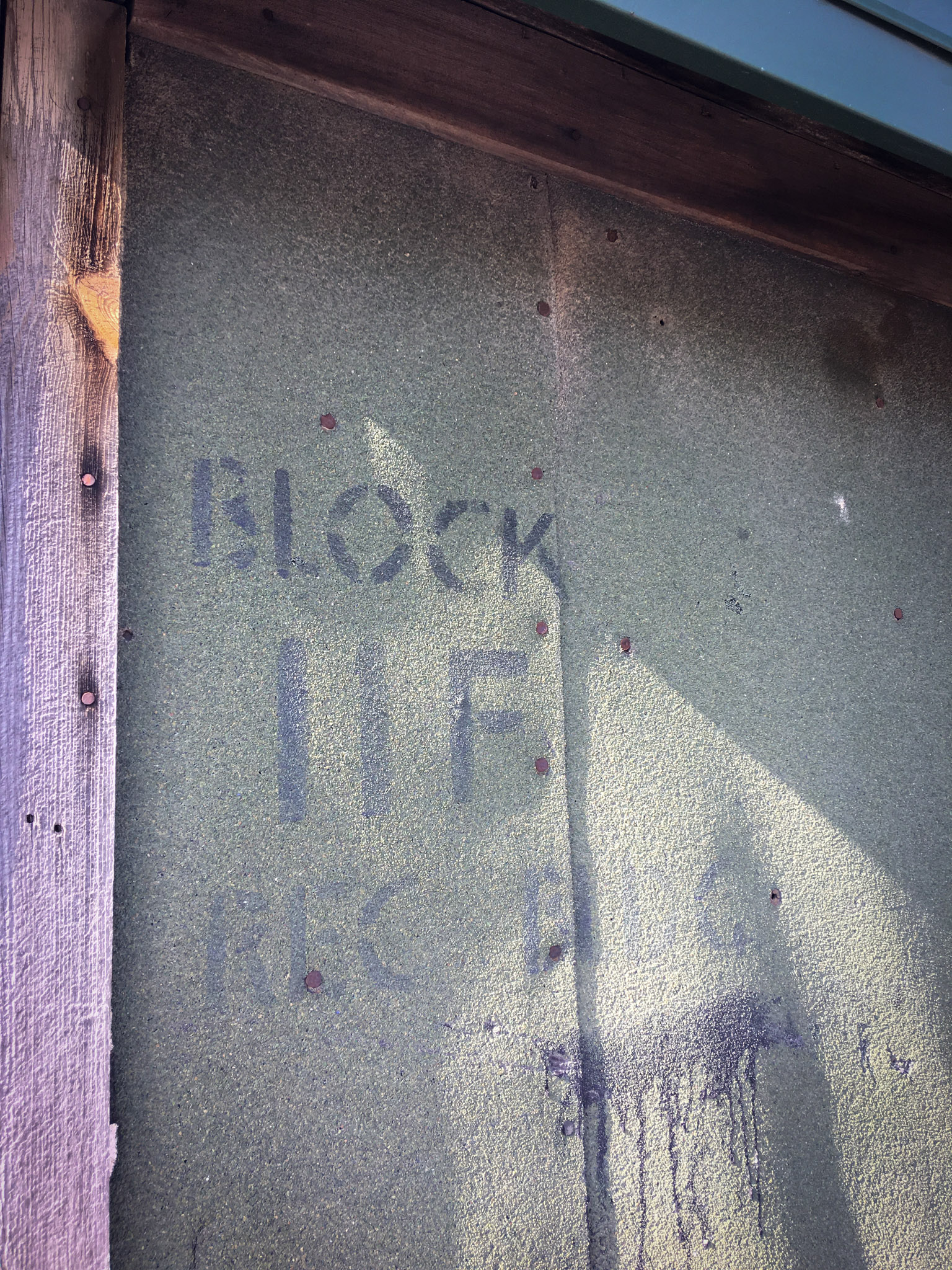 Closeup photo of the original block number assigned to this structure as part of the Amache Internment Camp. The structure was labeled Block 11F Recreation Building.