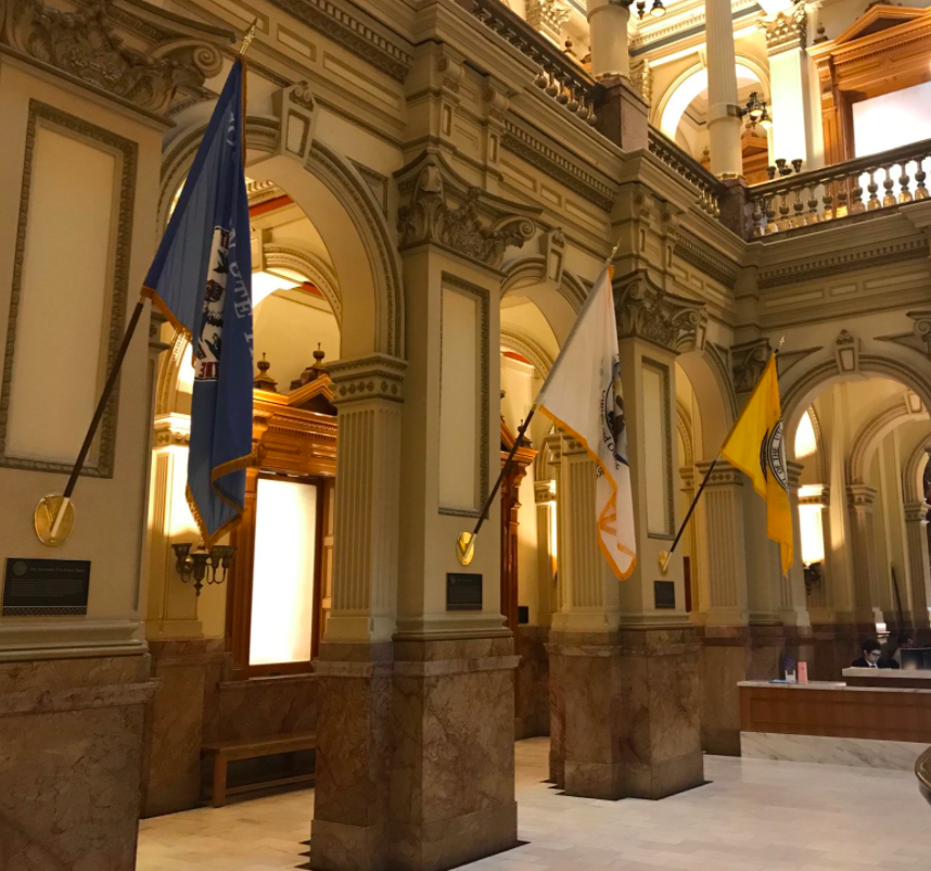 Three Ute tribal flags hung in the State Capitol building 