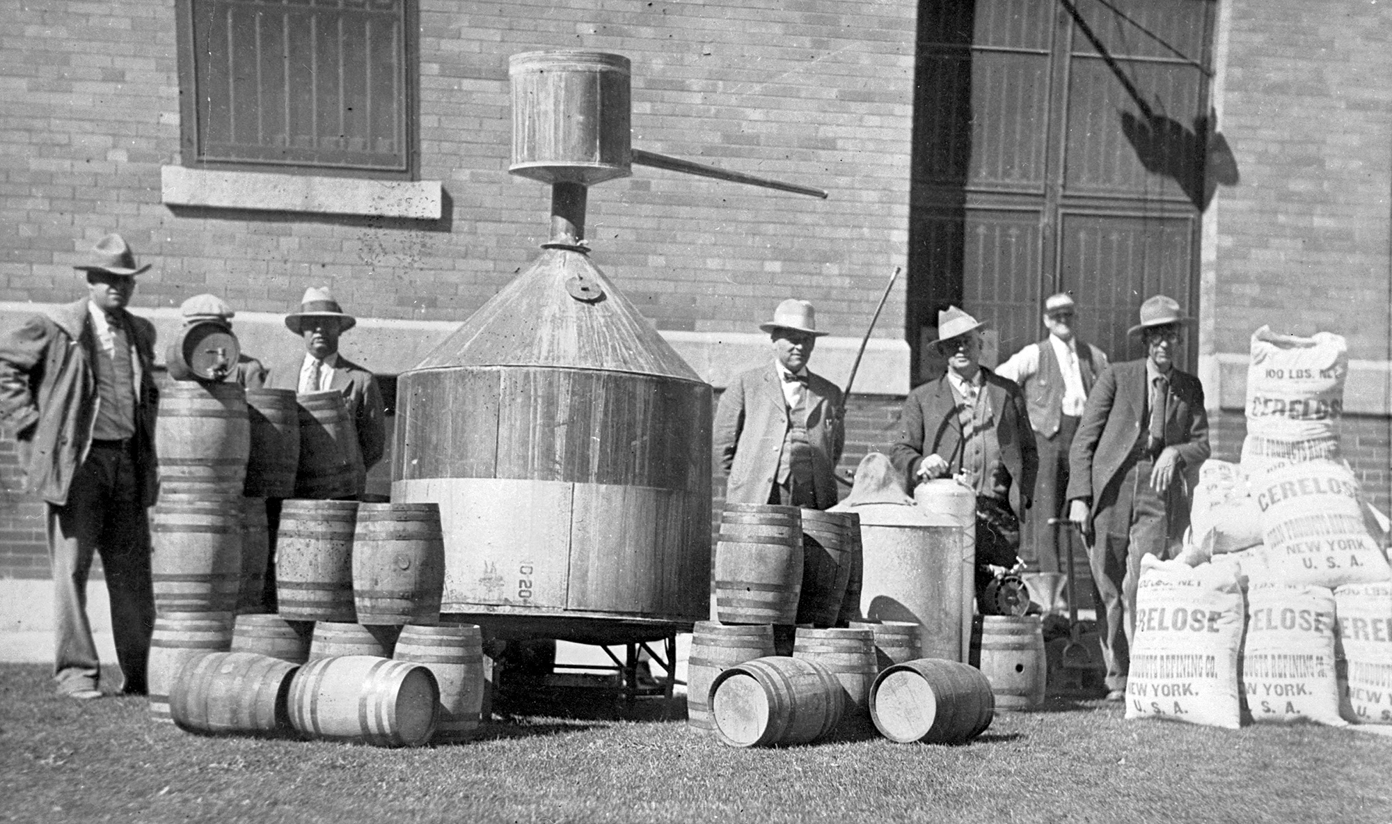 Photo of Prohibition agents bust bootleg shipments and a distillery, 1920s