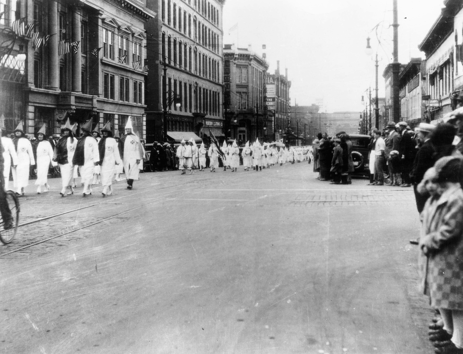 Ku Klux Klan members march down Larimer Street in Denver, 1926.