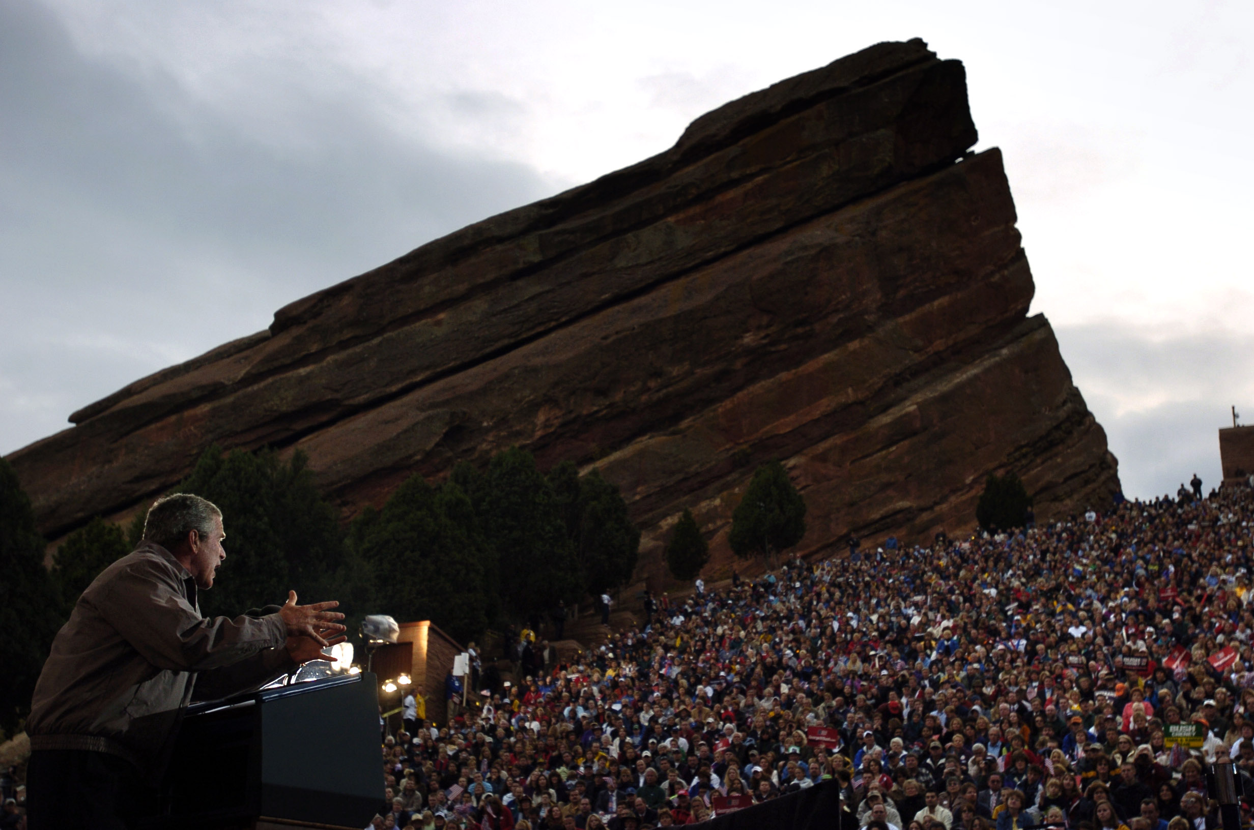 George W. Bush speaks at Red Rocks Amphitheatre to a large group.
