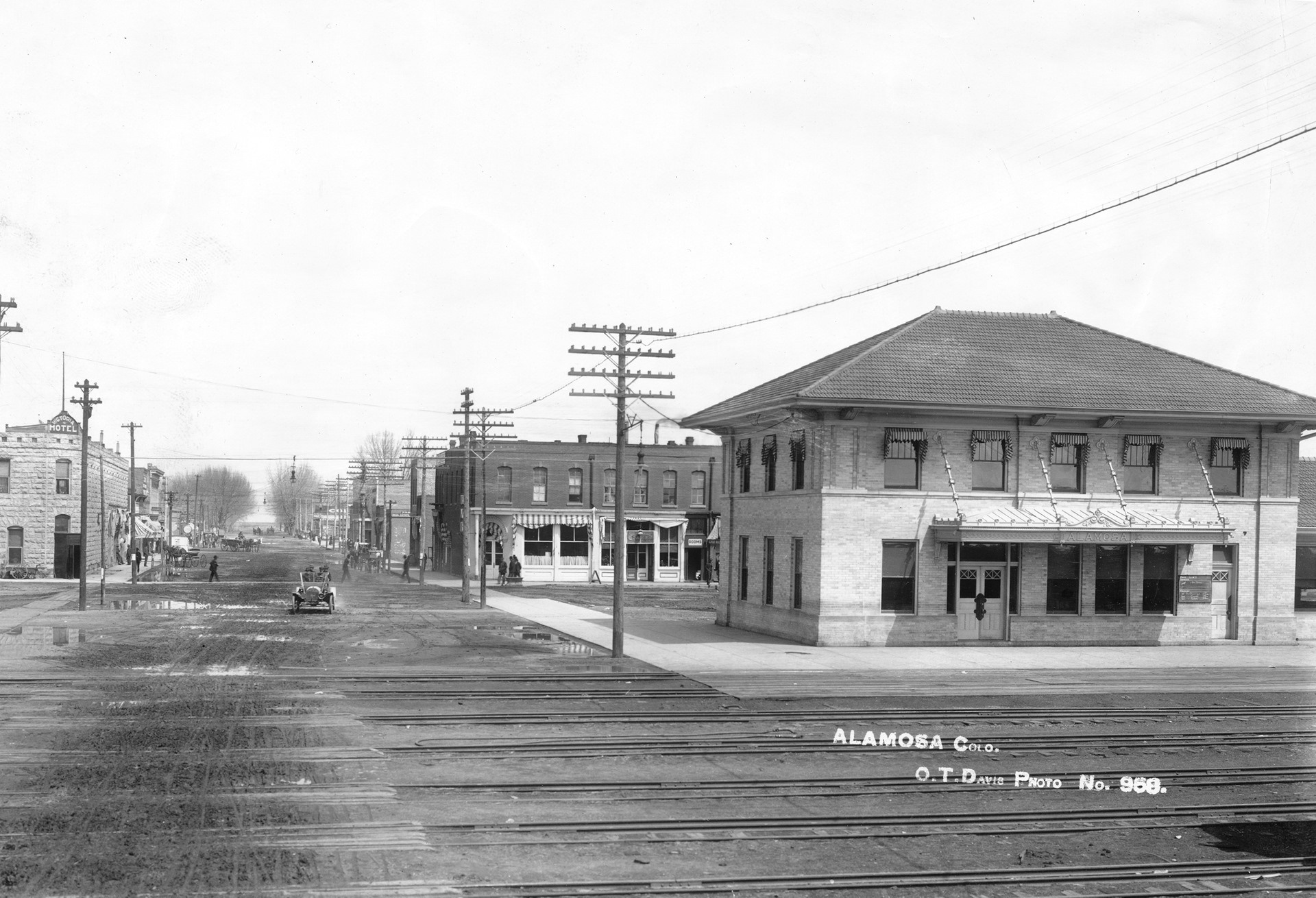 Train track crossing in Alamosa, Colorado, circa the early 1900s.