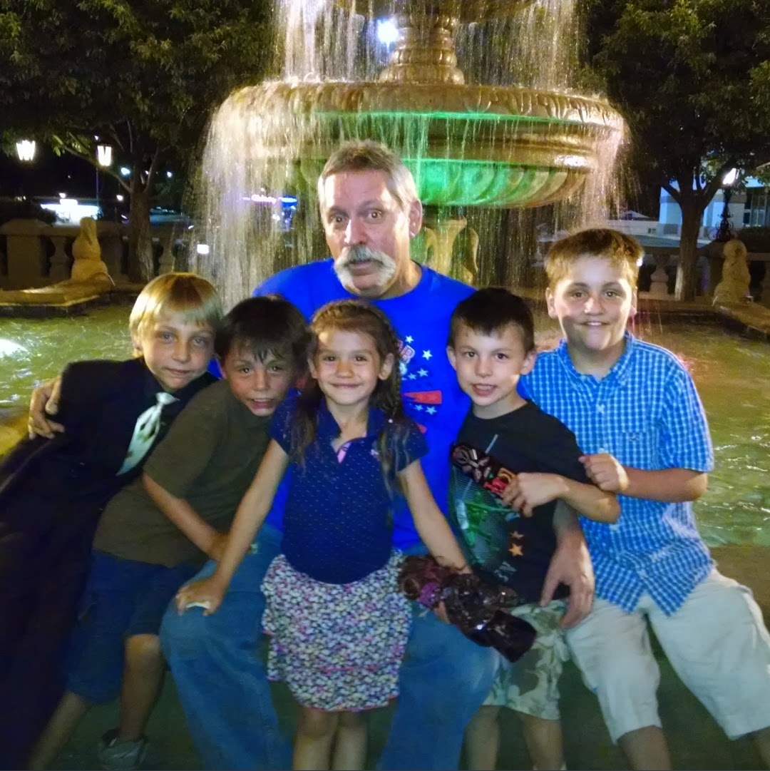 Steve Morton with his grandkids at Casa Bonita.