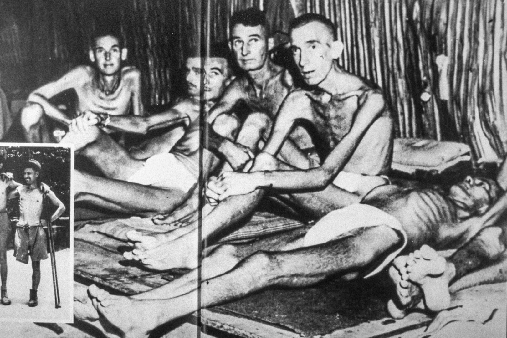 Emaciated POWs in beds
