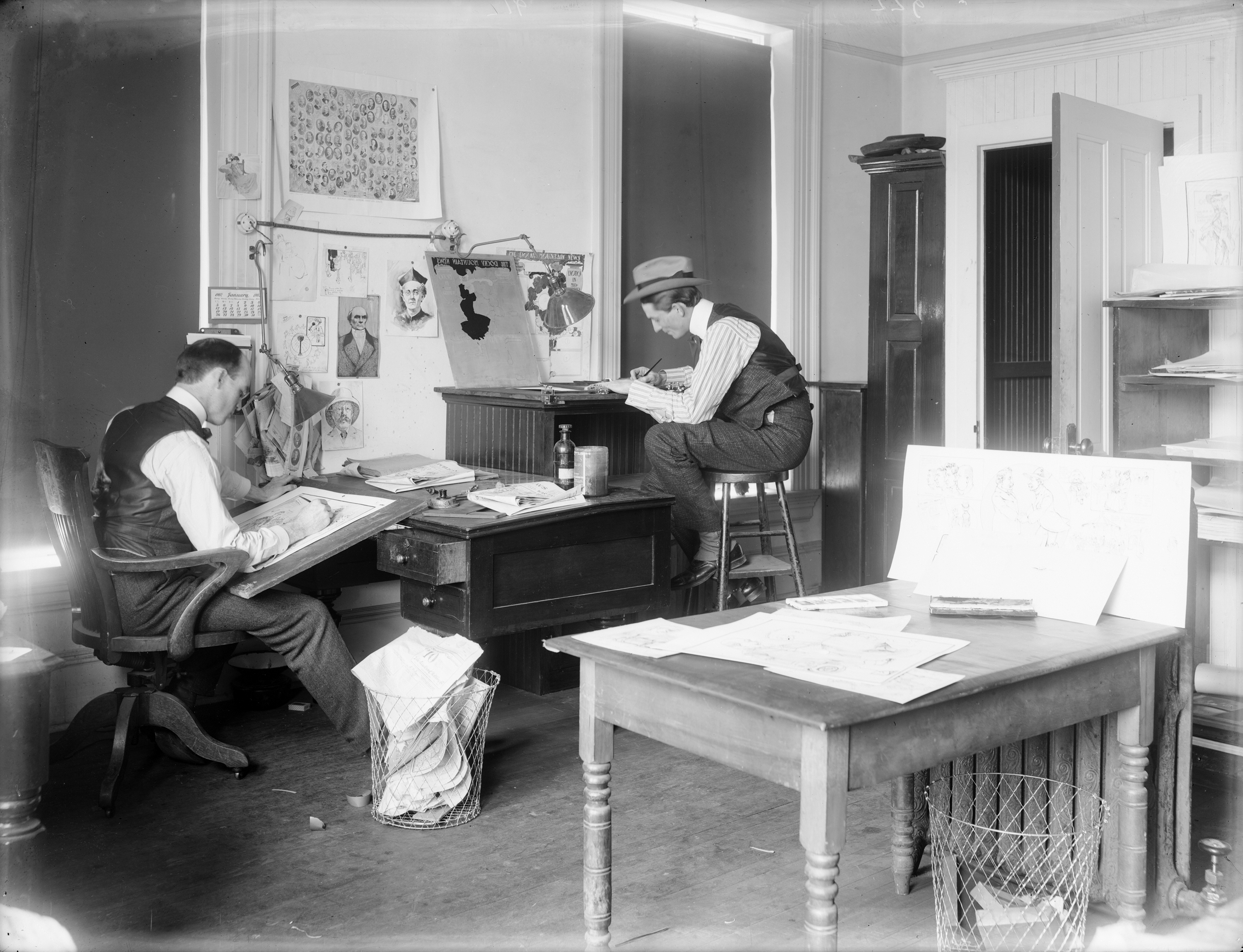 Rocky Mountain News employees at work in the newspaper's art office