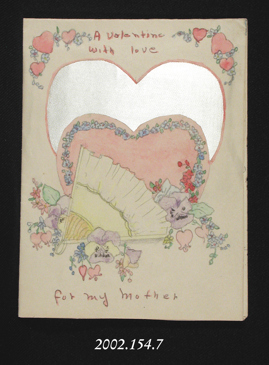 A hand-made Valentine card reading: "A Valentine with love for my Mother."