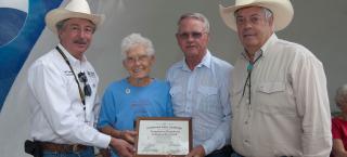 Templeton family members receive their award at the Colorado State Fair.