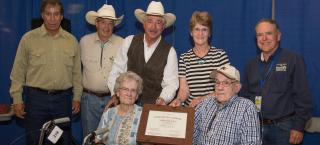 Ashbaugh Farm members receive their Centennial Farm award.