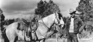 Clarence Everett and his horse, Buck.