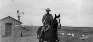 Marshall Fulbright on his horse on the family farm during the 1940s.