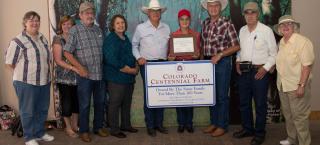 Members of the Stanley's Hightower Homestead with their Centennial Farm & Ranch award.