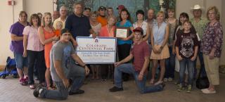 Weirich Ranch Family with their Centennial Ranch award.