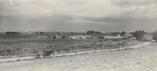A wide view of the Westesen Farm & Ranch in 1929 with the family Buick Roadster in the foreground.