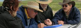 Three survey volunteers with former assistant State Archaeologist Keving Black (right) on the 2014 PAAC Summer Survey in the Pawnee National Grasslands