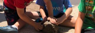 Children make adobe at the History Colorado Center