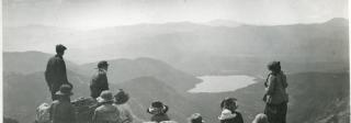 Members of the Colorado Mountain Club looking west towards Grand Lake from on top of the Continental Divide.
