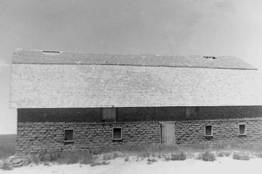 Historic photograph of a sod brick barn on the Coe Homestead.