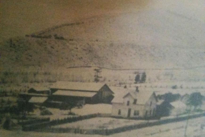Historic photograph of the ranch in the snow, 1897, before its purchase by the Groy family.