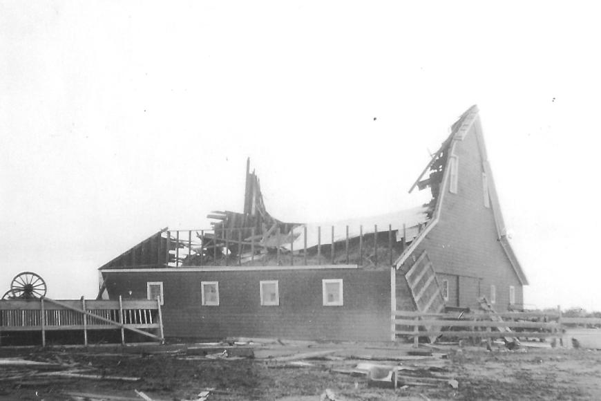 Photograph showing damage to the Trautman-Glenn Farm barn after the 1926 tornado.