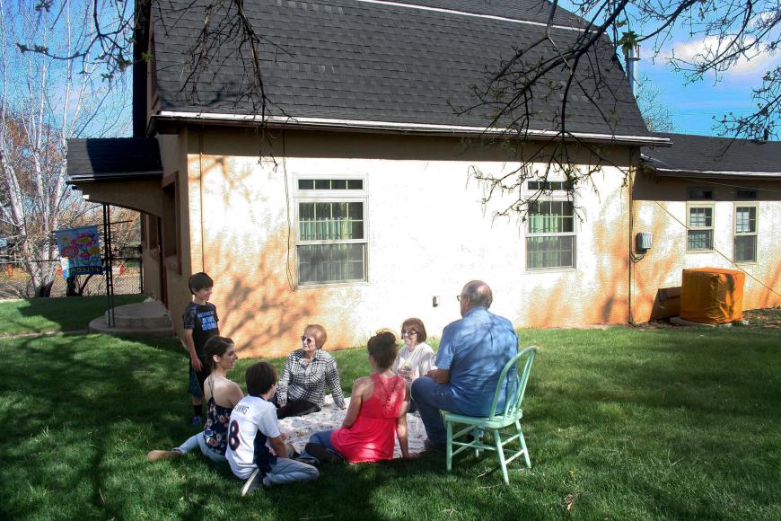 A 2017 re-creation of a 1940s family picnic photo on the Ugolini Farm.  The picture also shows the expansions and modifications done to the home over the years.