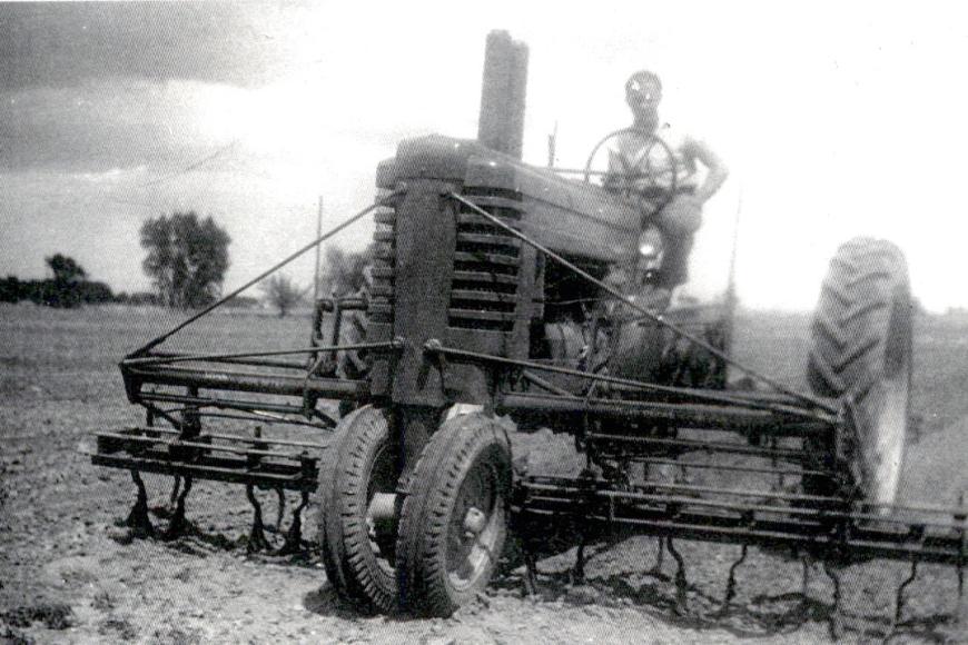 John Koch on a John Deere tractor in 1946.