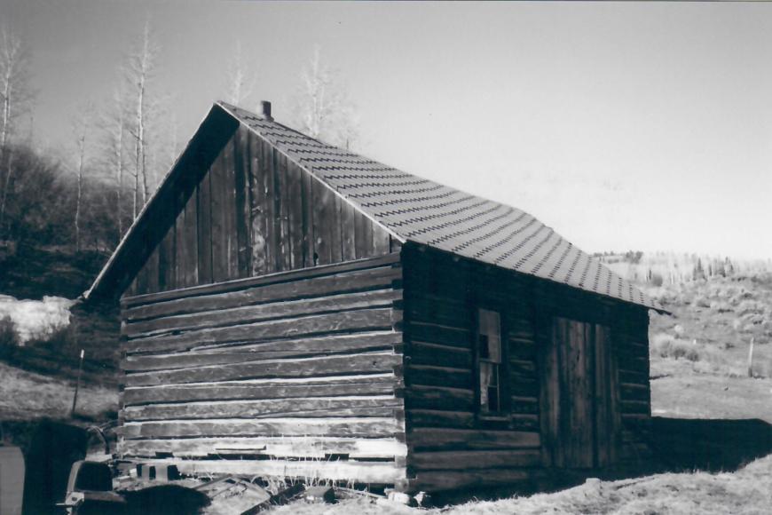 A square-cut log homestead cabin that was moved to the ranch from a nearby parcel of land in the 1920s.  It is now the blacksmith shop.
